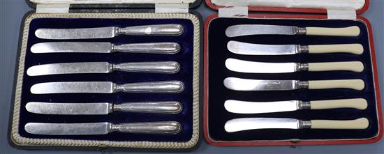 Two cased sets of six cake knives including silver handled.